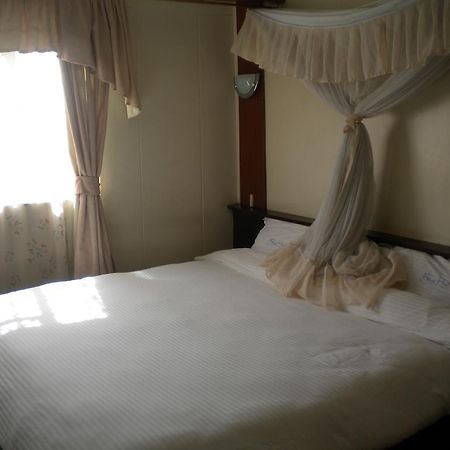 Blue Hut Hotel Найроби Номер фото